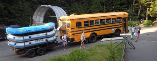 bus with raft trailer